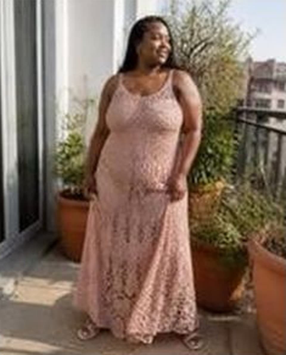 Blush crochet lace maxi dress with a handkerchief hem, worn