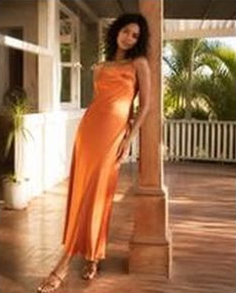 Tangerine satin cowl-neck maxi dress, worn
